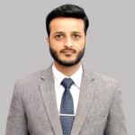 Portrait of Imran Ahmed, displaying a confident and professional demeanor.